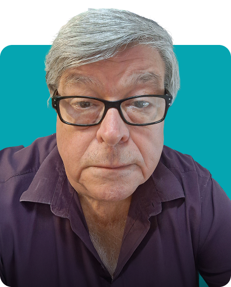 Elderly man wearing glasses with a serious expression